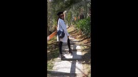 Woman Trips on Bag Strap