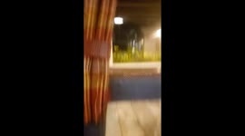 Woman Tries to Close Bar Window By Herself