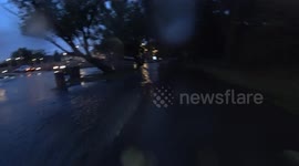 Wascana Lake Overflow Flood Control in Effect after a big thunderstorm this evening! BONUS Lightning strike, riding a bike!