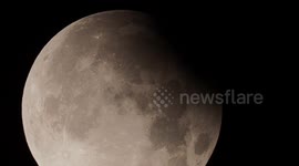 Stunning partial lunar eclipse of Harvest Supermoon above Kent, UK
