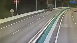 Passenger waddles in front of truck to hide plates from police