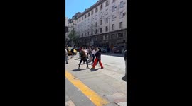 Mickey mouse mascot fights with another person in Córdoba street
