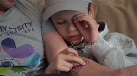 Dad gets alphabet tattoo to help autistic son to communicate