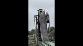 Girl's overdramatic reaction to getting soaked in water while aboard log flume ride