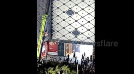 Acrobat is slammed into crane during aerial performance in central China