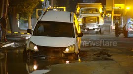 USA: Tarzana Car Drives Into Sinkhole