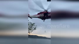 Italy: Helicopter Rescue for Lost Tourists in Forested Area Near Lake Albano, Rome