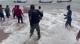 Storm hits island capsizing boats and damaging homes