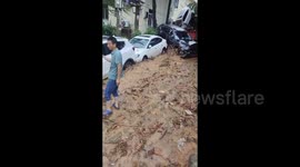 China: Cars Were Crashed Together by Mudslide