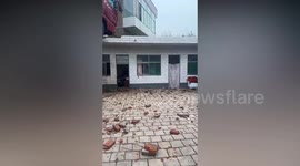Shocked homeowner discovers massive lorry on the roof of his home