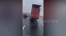 Lorry driver uses body weight to stop truck toppling over