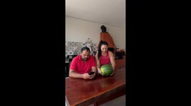 Woman Impatiently Breaks Open Watermelon