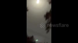 Partial Lunar Eclipse Coinciding With Harvest Supermoon Lights Up Night Skies 3