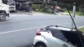 Out-of-control car skids on sand-littered road and crashes into expat's home