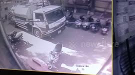 Truck plunges into sinkhole that opens up on street in India