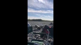 An-2 plane lands near tourists on riverbank in Yakutia, Russia