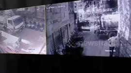 India: Close call! Municipal truck sinks into a pit after road collapses in western India