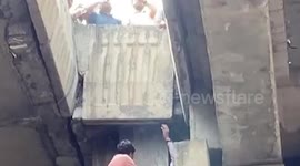 India: Update - Fire department rescues girl trapped on elevated road pillar in northern India