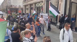 Protest outside Apple Store has they release their new iPhone 16