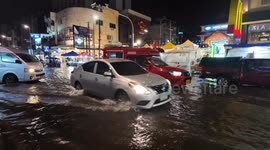 Chiang Mai, Thailand Night Bazaar flooded by thunderstorms as tropical storm Soulik reaches the country