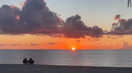 Couples Enjoying Florida Sunrise
