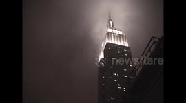 Camcorder Footage of Empire State Building Shrouded in fog during wet snowfall - Part 5