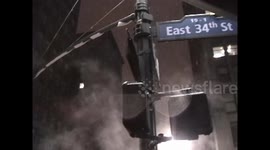 Old camcorder footage shot from 34th Street and 5th Ave in Manhattan in the rain