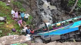 Dozens injured after bus crashes off bridge in central India
