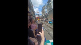 Thailand railway market disaster as train crashes into metal pole from parasol