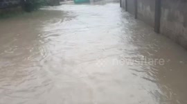 Floods surge through flooded streets in northern Thailand