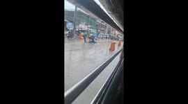 Bungling motorcycle rider gets stuck in wet concrete