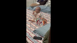 When you're upset but the food is good: Chinese baby can't decide whether to cry or to eat