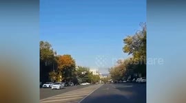 Kazakhstan: Guy Drags Woman Whose Hand He Had Been Holding Down Road To Stop Her Being Run Over