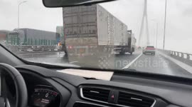 Small truck prevents larger vehicle from toppling over