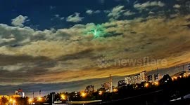 Dazzling fireball lights up Beijing night sky as dashcams capture spectacular blue-green meteor streaking overhead