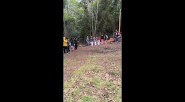 Dog interrupts sack race with raunchy action