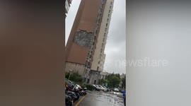 External cladding on high-rise building ripped off by typhoon in China