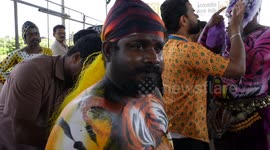 Hundreds of devotees paint themselves as tigers in vibrant Indian festival
