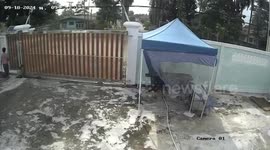 Housekeeper leaps like a gazelle to avoid car hurtling into gate