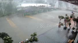 Gustnado blows away tent during storm in China