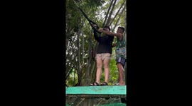 Rope swing goes wrong as lad back flops into lagoon