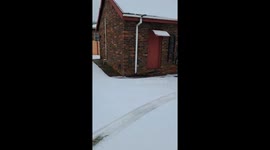 70-year-old enjoys driving in the snow in Volksrust, South Africa