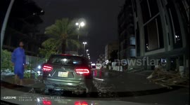Dash cam captures wood structure collapse hitting car in Jeddah, Saudi Arabia