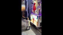 Toddler takes on Turkish ice cream seller