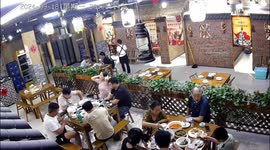 Moment restaurant diners jump up and flee for their lives as earthquake strikes during meal