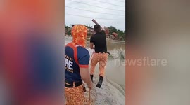 Firemen rescue youngster swept away by floods while bathing in river