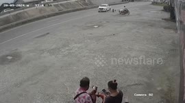 Loose tyre detaches and rolls towards customers outside shop