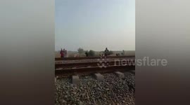 Mother and her two children killed while playing on railway line in Indonesia