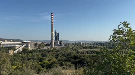 footage captures the demolition of a Soviet-era industrial chimney at Bulgaria's largest cement plant