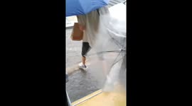 Phone washes away in flash flood after falling from passenger's pocket